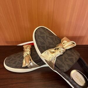 Michael Kors Brown Slip-Ons with Gold Knot